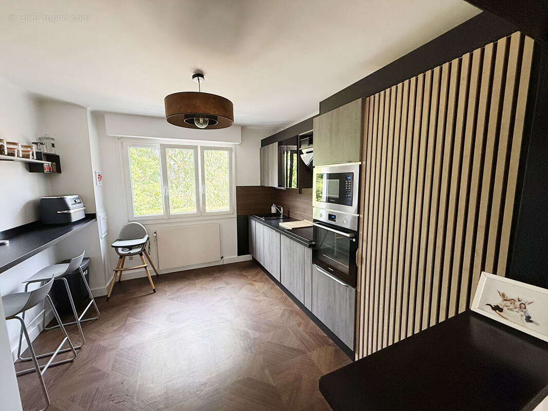 Appartement T4 de 99m2, cave et parking - photo 5