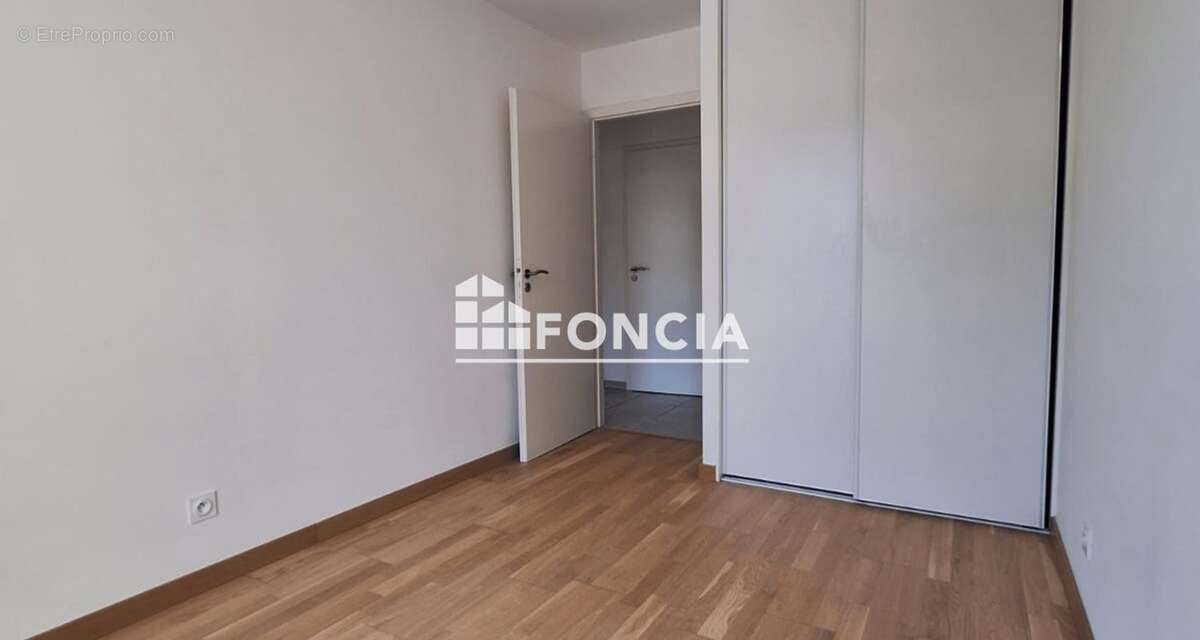 St Genis Pouilly. Ce charmant appartement de type 3 offre une superficie de 71 m2 et dispose d'une terrasse 2 place en sous -sol - photo 5