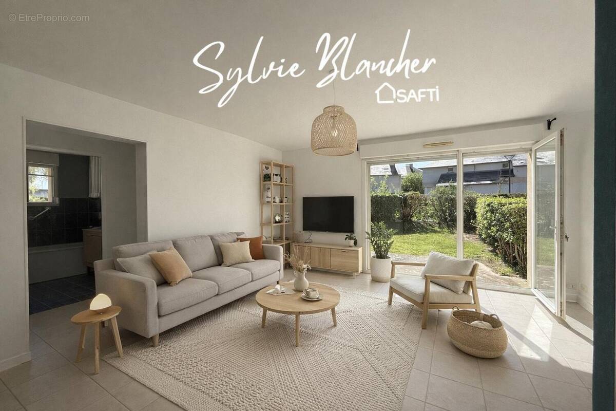 Photo 1 - Appartement à HEROUVILLE-SAINT-CLAIR