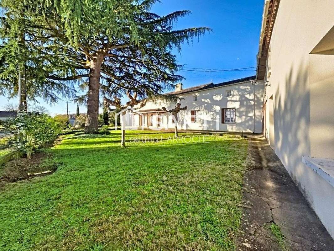 Photo 2 - Maison à CAUBON-SAINT-SAUVEUR