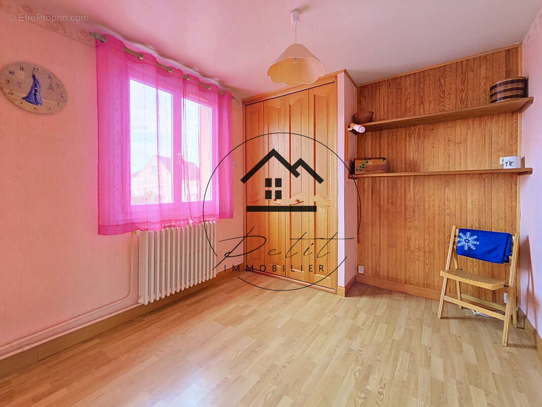 Maison familiale de 107 m2 avec 4 chambres et sous-sol total - photo 10