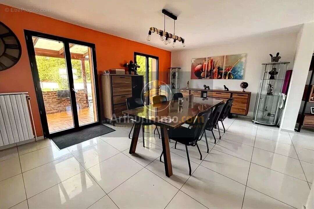 Maison à GUIGNES