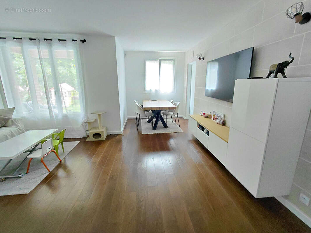 Appartement  76 m² en rez-de-jardin (3 chambres) - photo 3