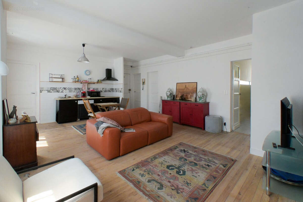 Salon/Séjour avec cuisine ouverte - Appartement à ROYAN