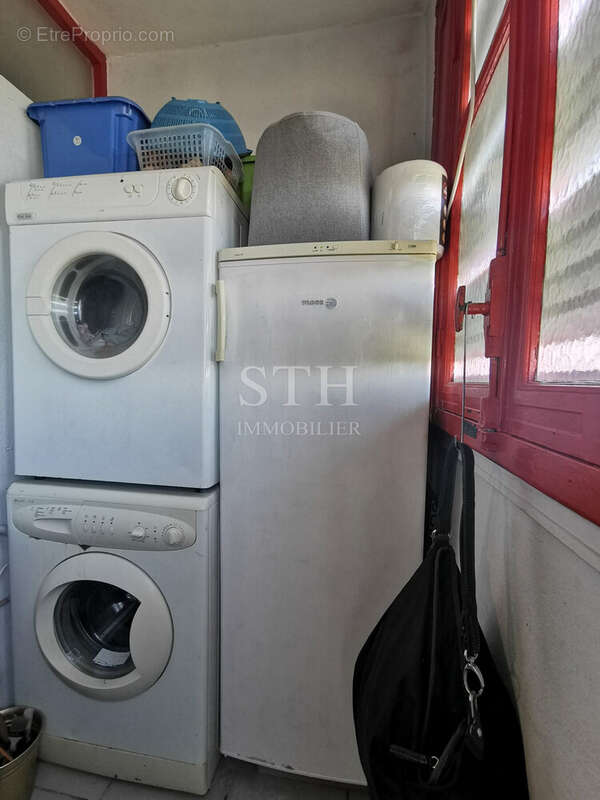 Parite buanderie aérée - Appartement à EPINAY-SUR-SEINE