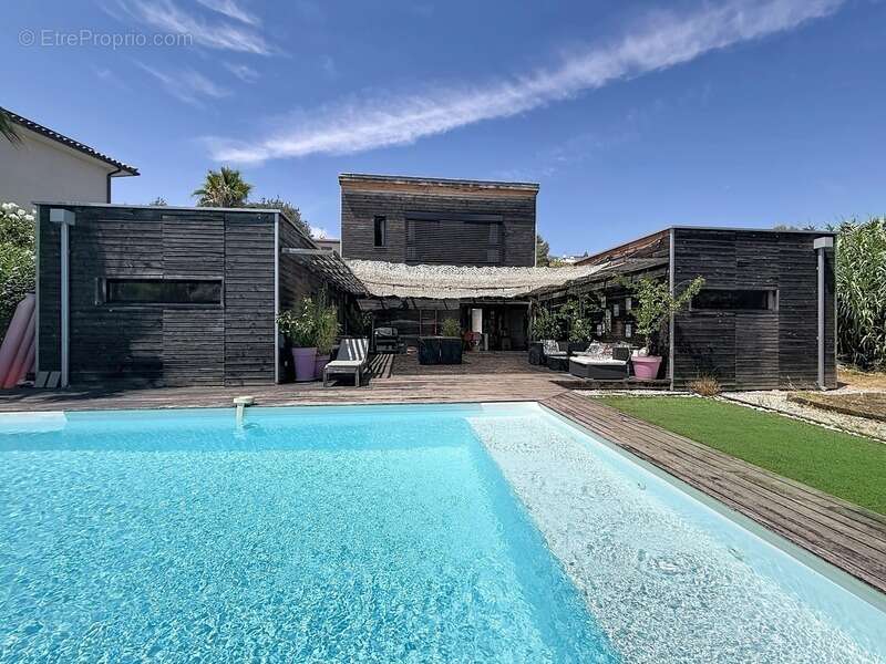 Juvignac : fontcaude – villa contemporaine en bois avec piscine et vue panoramique sur le golf - photo 17
