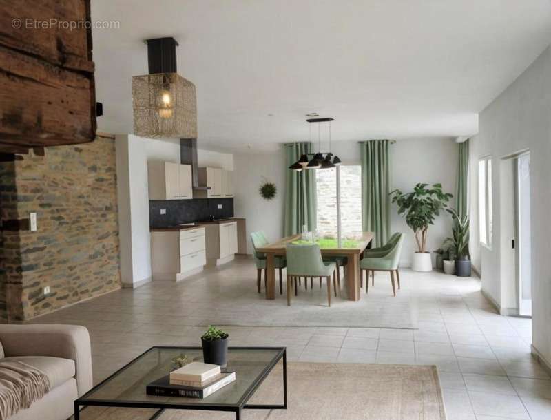 Maison à LA BOUEXIERE