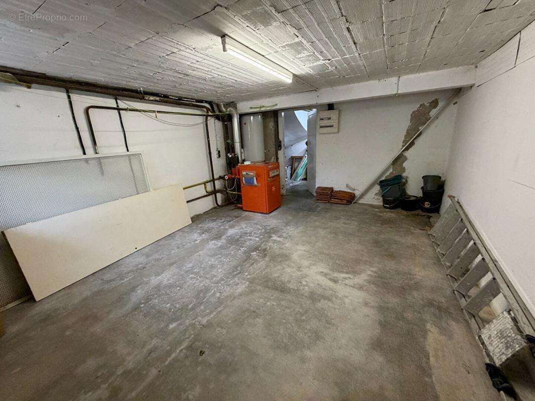 Maison centre-ville avec 3 chambres, jardinet et garage - photo 3