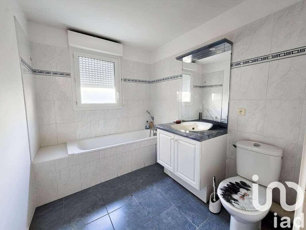 Photo 6 - Appartement à CHANTELOUP-LES-VIGNES