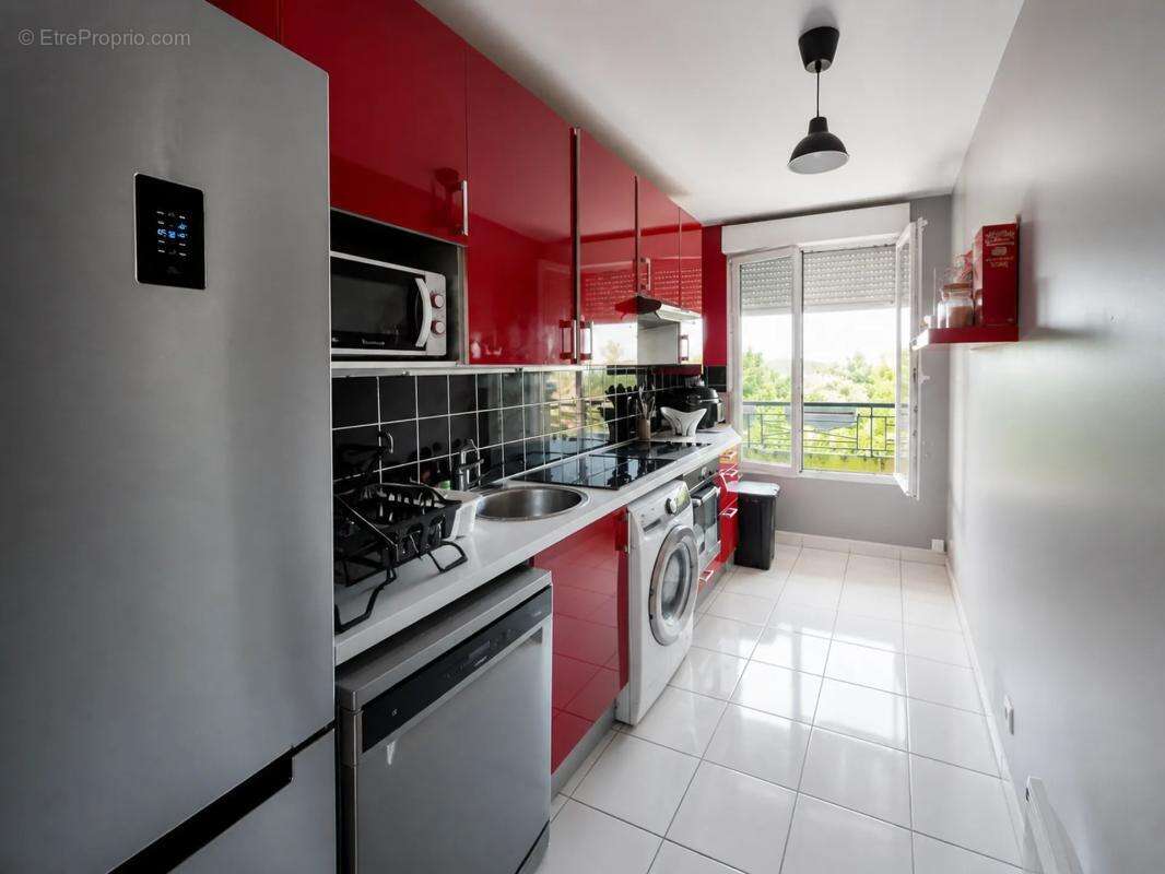 Appartement de 4 pièces de 84 m² à Beaumont-sur-Oise - photo 5