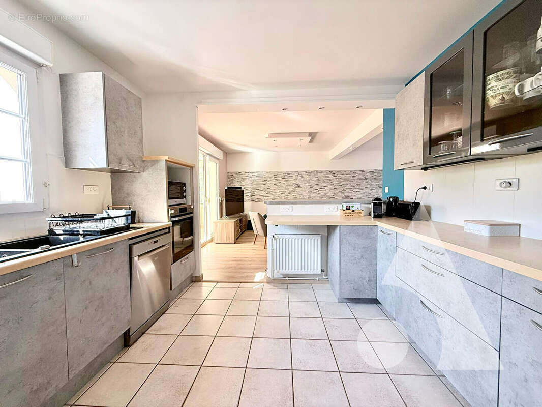 Maison 4 chambres vivable de plain pied sur sous-sol avec jardin - photo 4