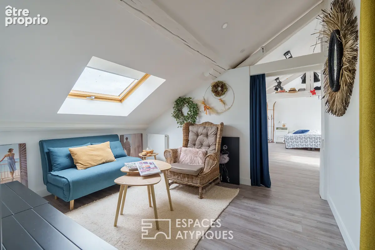 Appartement sous les toits à la charpente apparente - photo 4