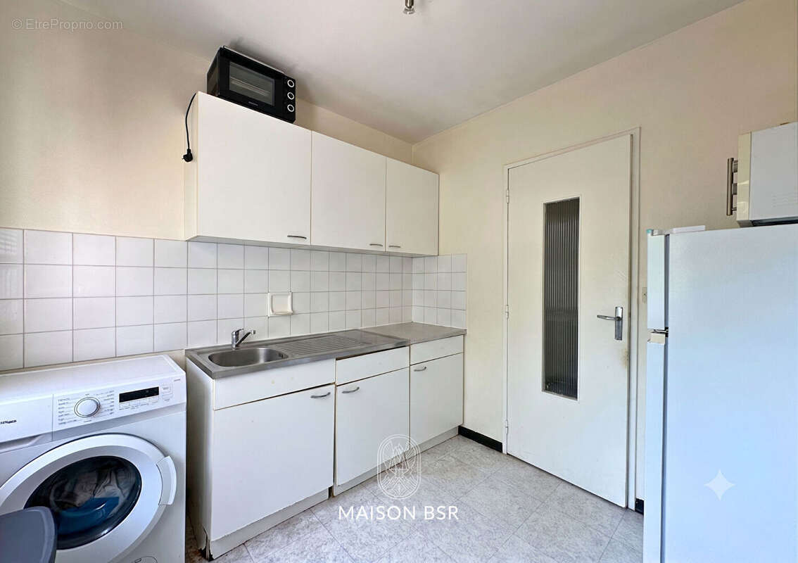 Appartement T2 avec balcon, parking et cave - photo 4