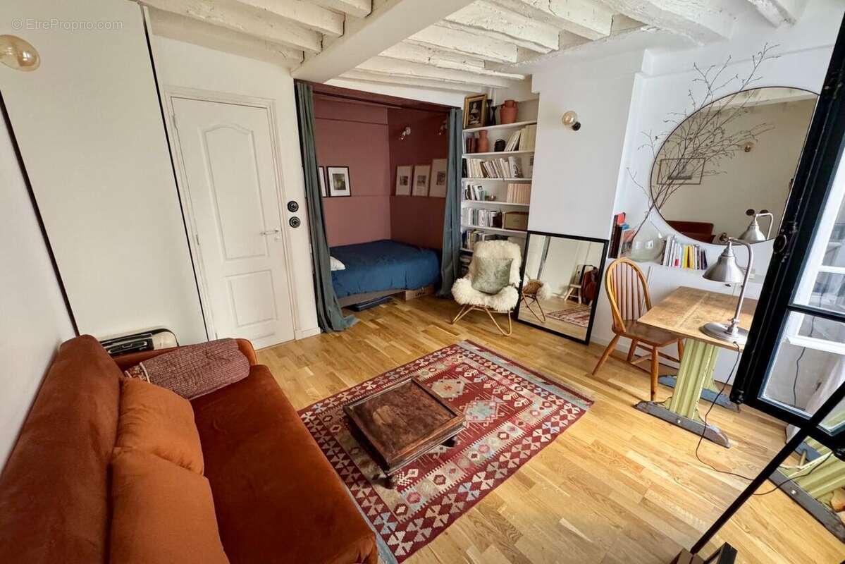 Appartement 25 m² à Paris-3e  - photo 4