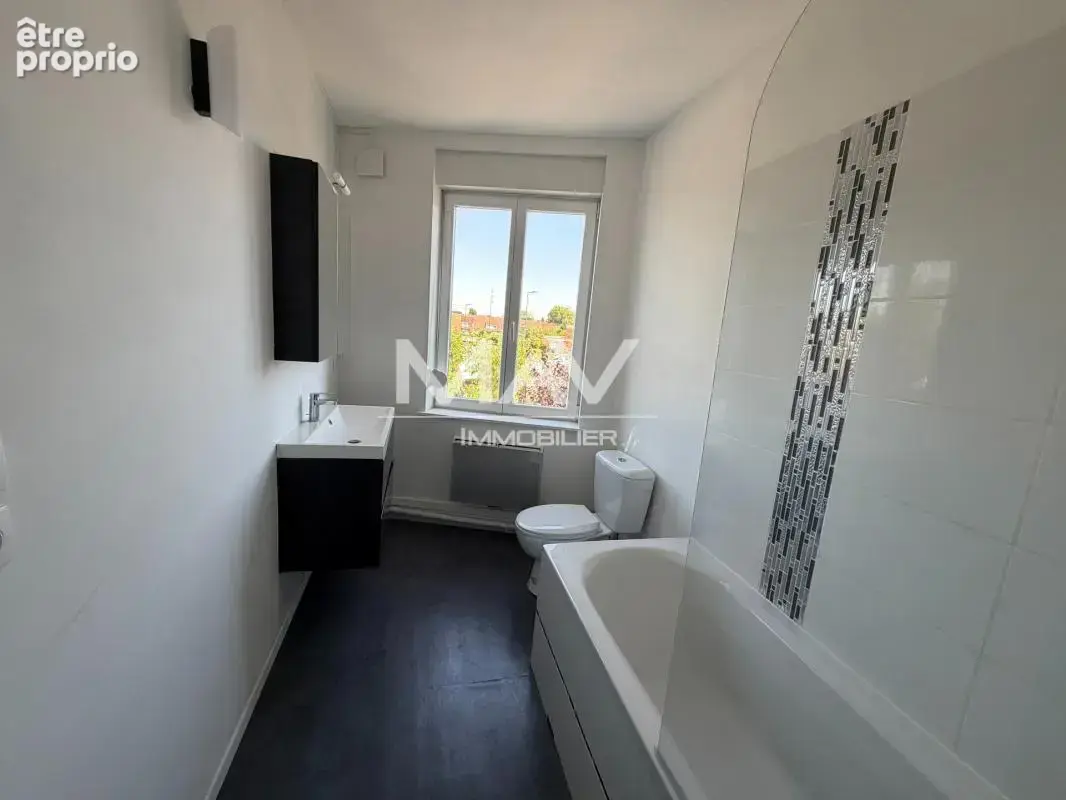 Maison 78 m² à Neuville-En-Ferrain  - photo 11
