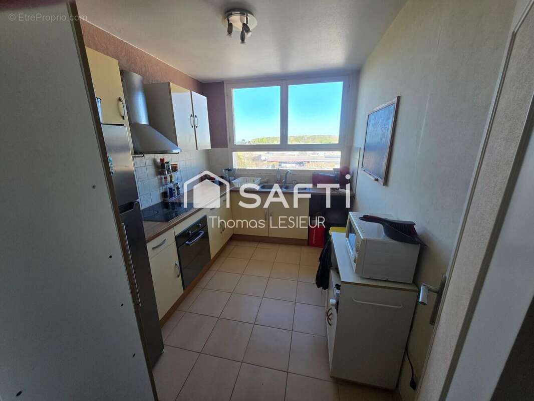 Photo 3 - Appartement à HEROUVILLE-SAINT-CLAIR