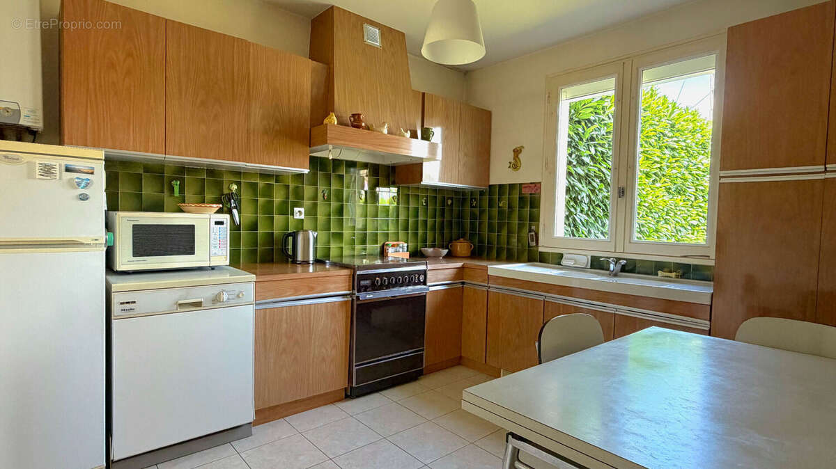 ORVAULT PRAUDIERE - Maison familiale avec 4 chambres - photo 4