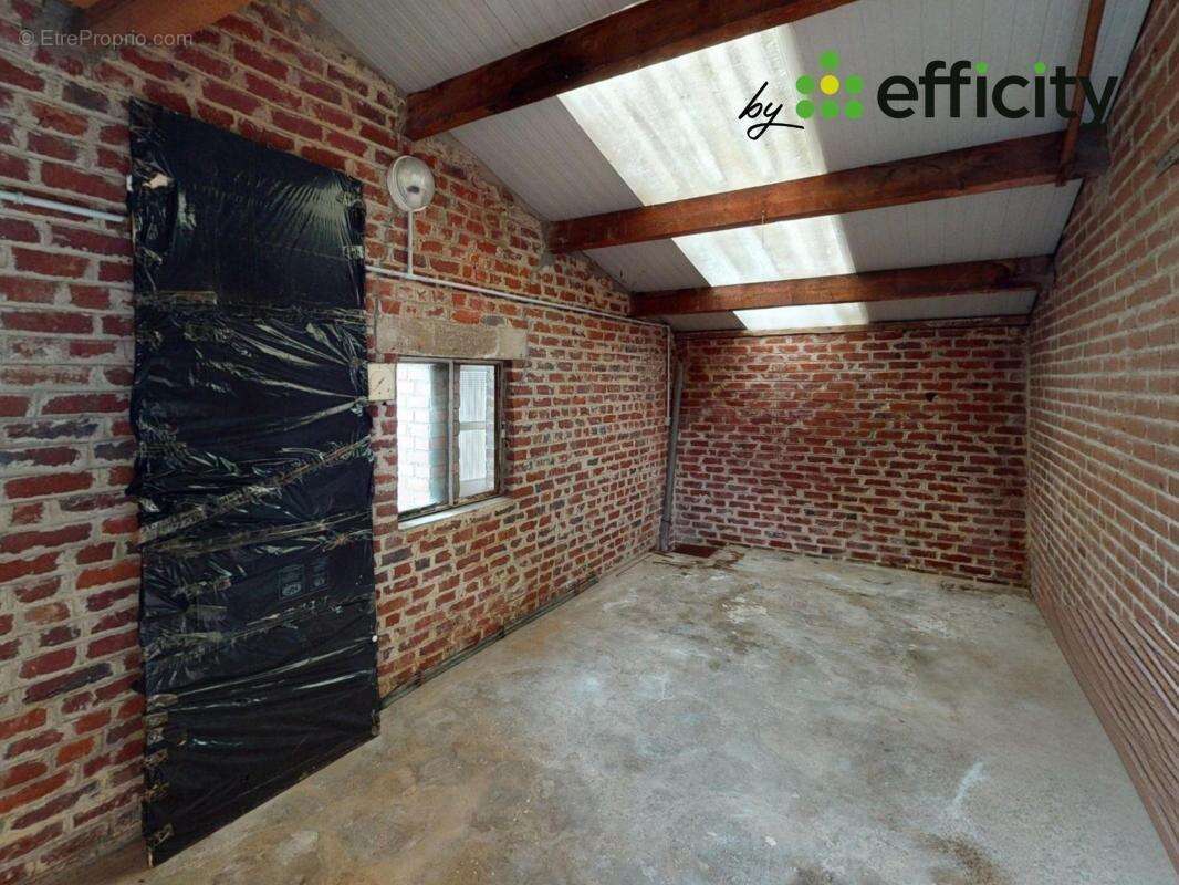 Maison à AULNOYE-AYMERIES