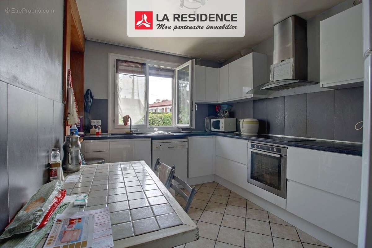 Maison 132 m² à Saint-Etienne-Du-Rouvray  - photo 4