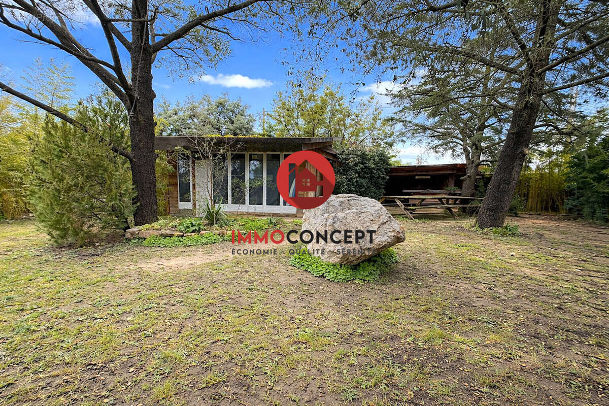 Maison à LAUDUN-L'ARDOISE