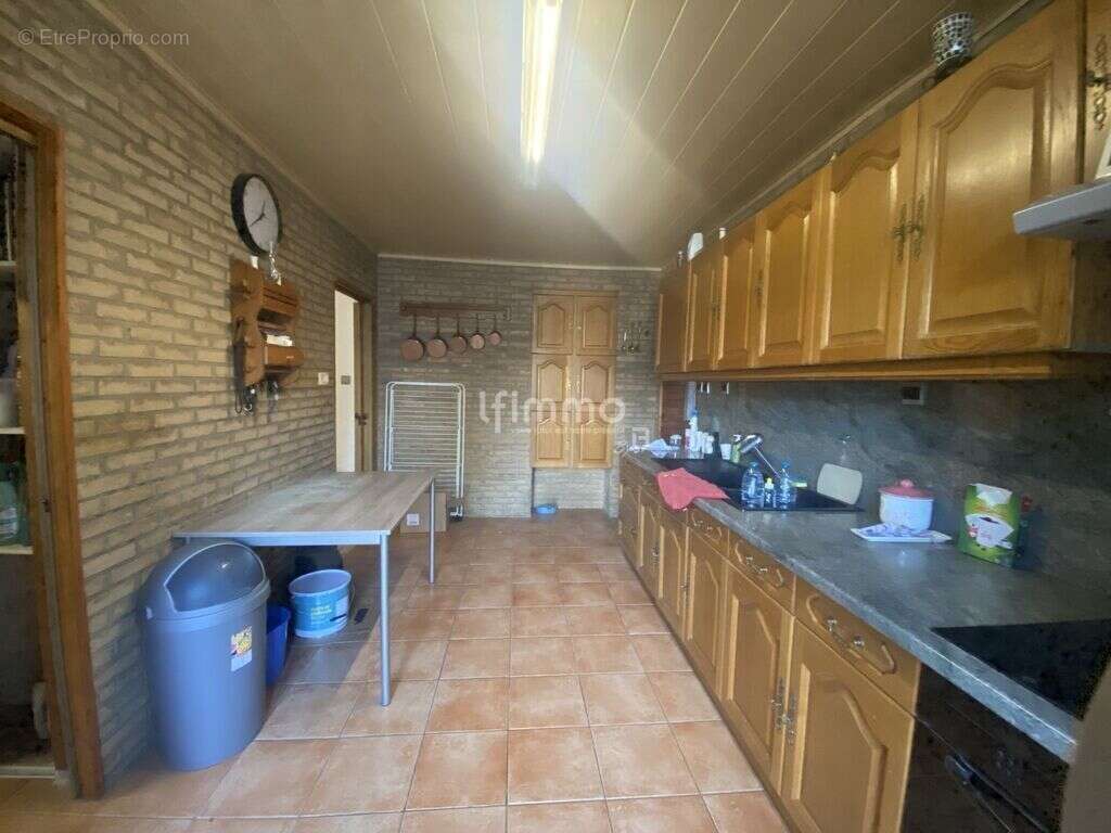 Maison à QUIEVRECHAIN