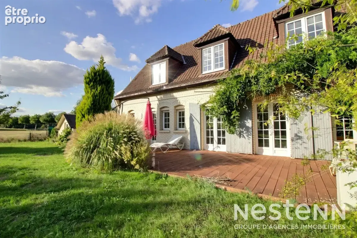 Maison individuelle - grand terrain - 5 chambres dont une au rez-de-chaussée - garages - stationnement - photo 2