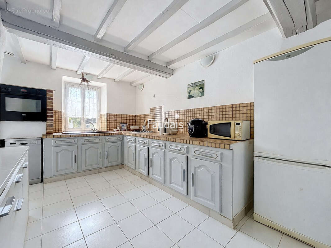Maison 80 m² à Sainte-Honorine-Du-Fay  - photo 4