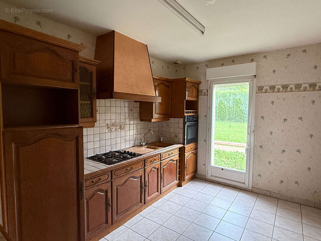 Maison à DONCHERY