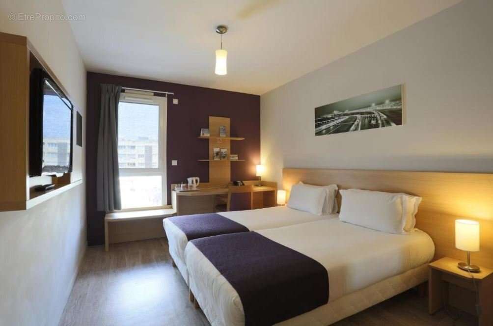 INVESTISSEMENT LOCATIF  SAINT-PRIEST  Résidence Affaires Eastlodge Lyon Est Eurexpo - 6,82 % de rentabilité - photo 2