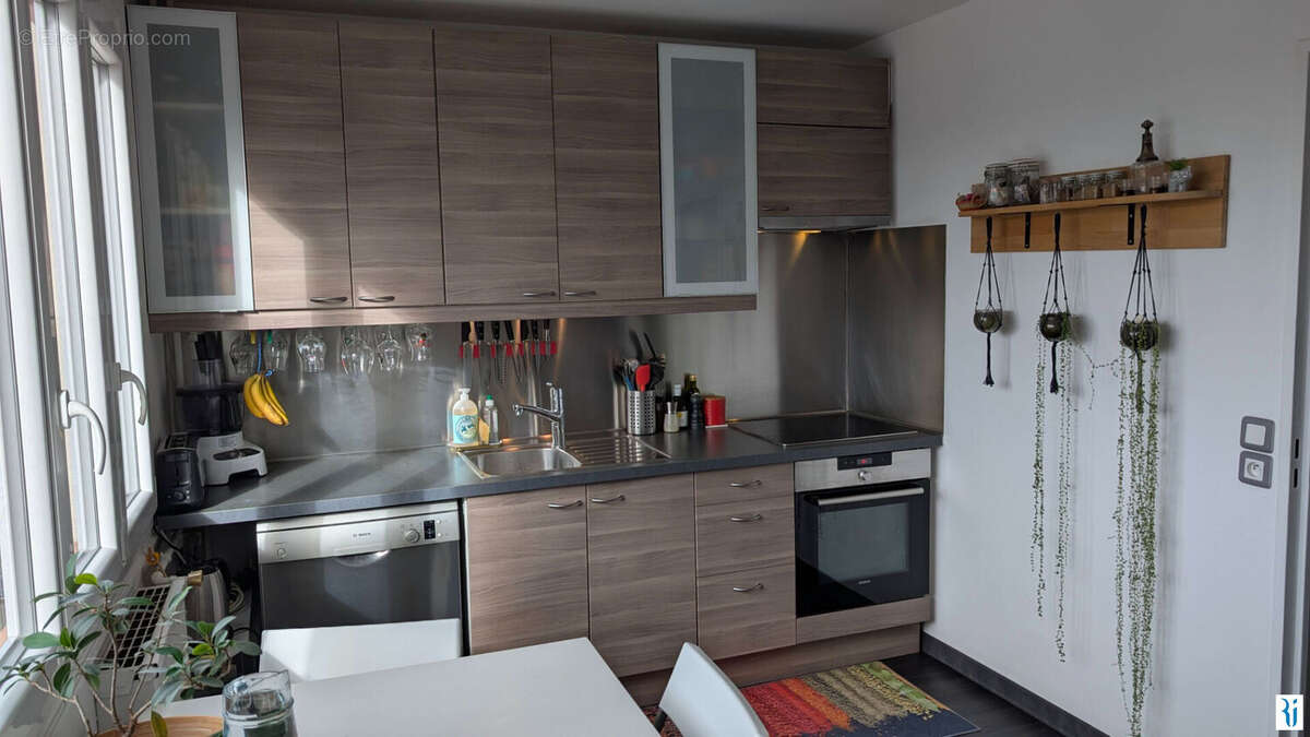 Appartement de 50 m² .Vue panoramique sur Rouen et la Seine . Idéal premier achat ou investissement - photo 4