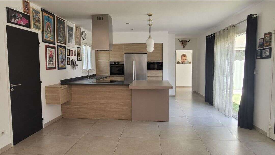 Maison 150 m² à Saint-Drezery  - photo 3