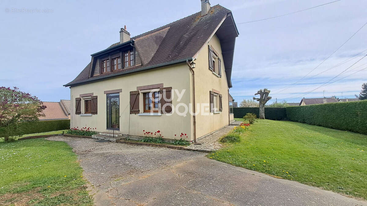 RUGLES - Maison familiale avec sous-sol complet - 4 chambres - photo 2