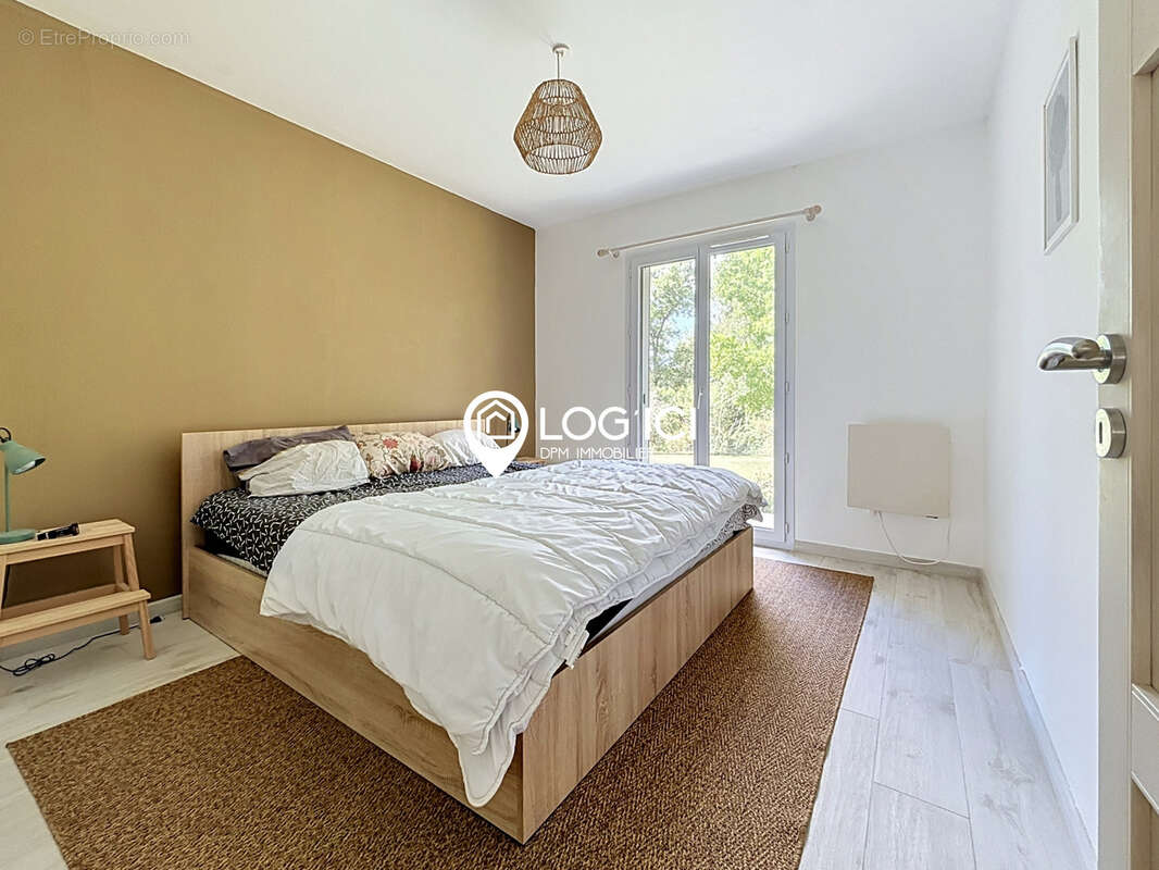 Maison de plain-pied de 114 m2 avec grand séjour et 4 chambres en lisière de forêt - photo 12