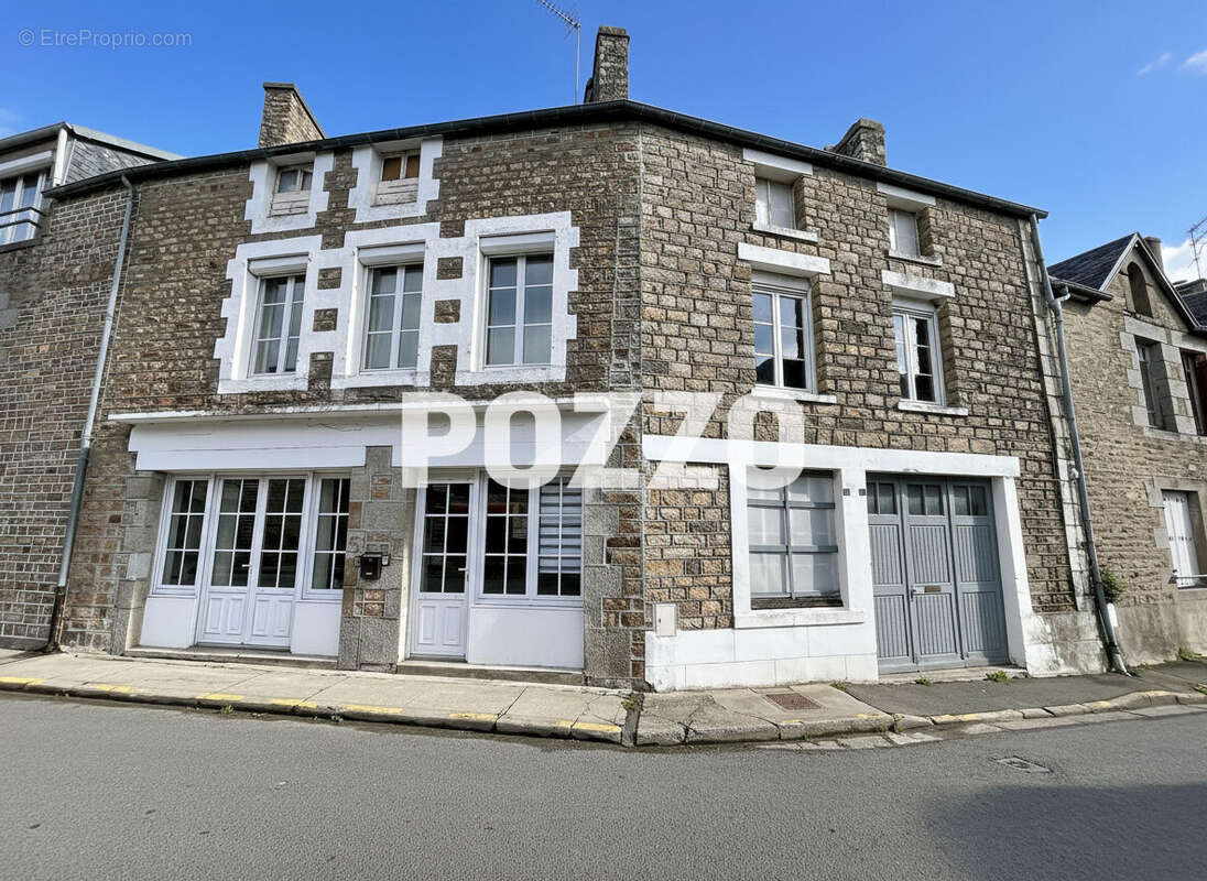 Maison 6 pièces à Genêts : 3 logements communicants avec beau potentiel locatif - photo 17