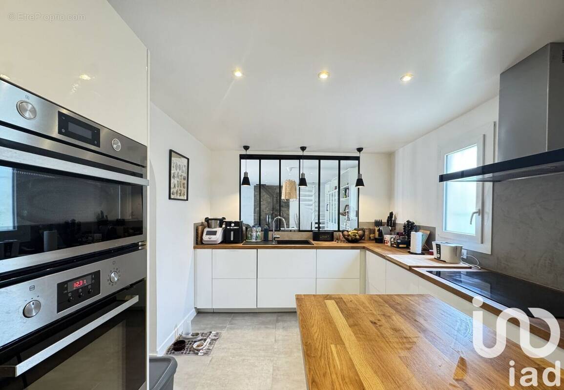 Photo 1 - Maison à LES CLAYES-SOUS-BOIS