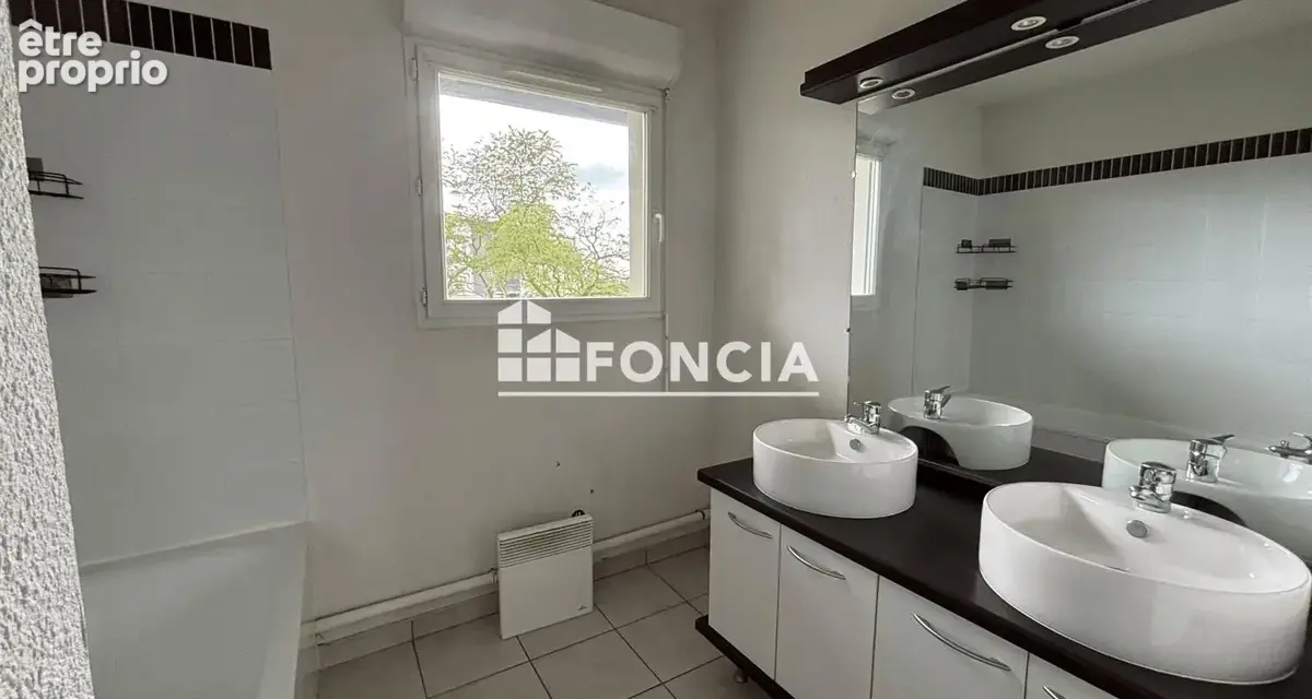 Investissement locatif : Appartement 3 pièces avec parking - photo 5