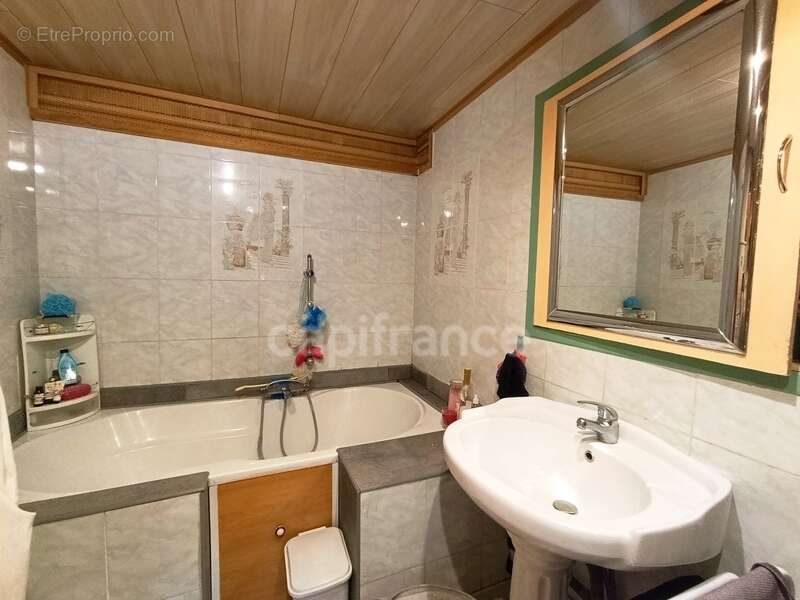  Spacieuse maison bourgeoise de 280 m² – Habitez et générez un revenu locatif avec 50 m² en plus ! - photo 12