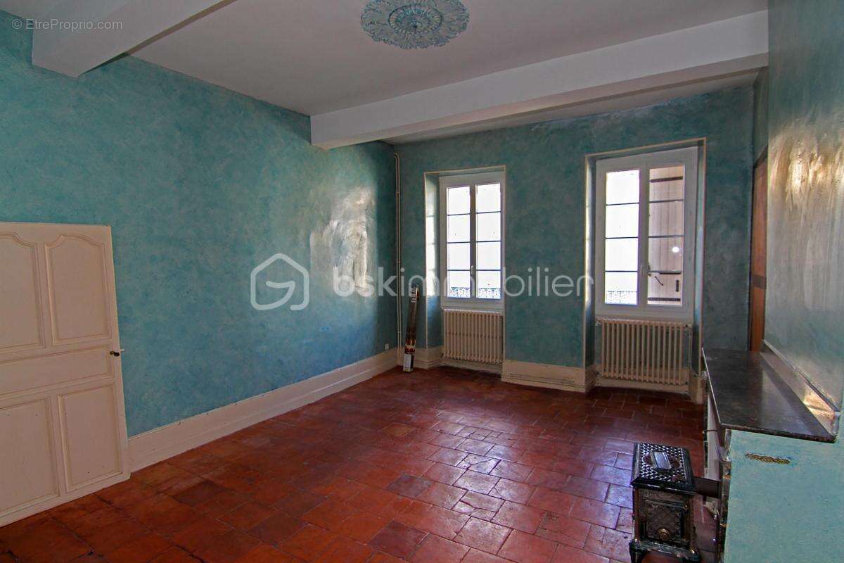 Au cœur de Saint-Clar, un immeuble aux volumes généreux et au fort potentiel - photo 7