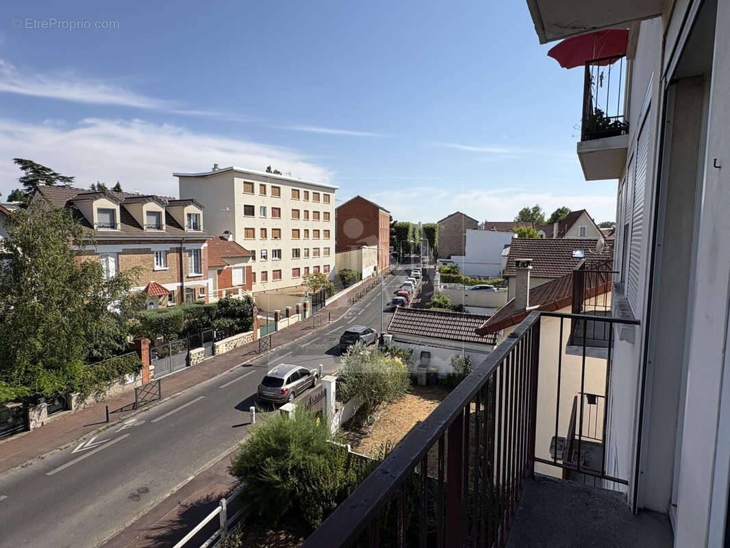 Appartement 3 pièces traversant avec balcon, parking et cave - photo 8
