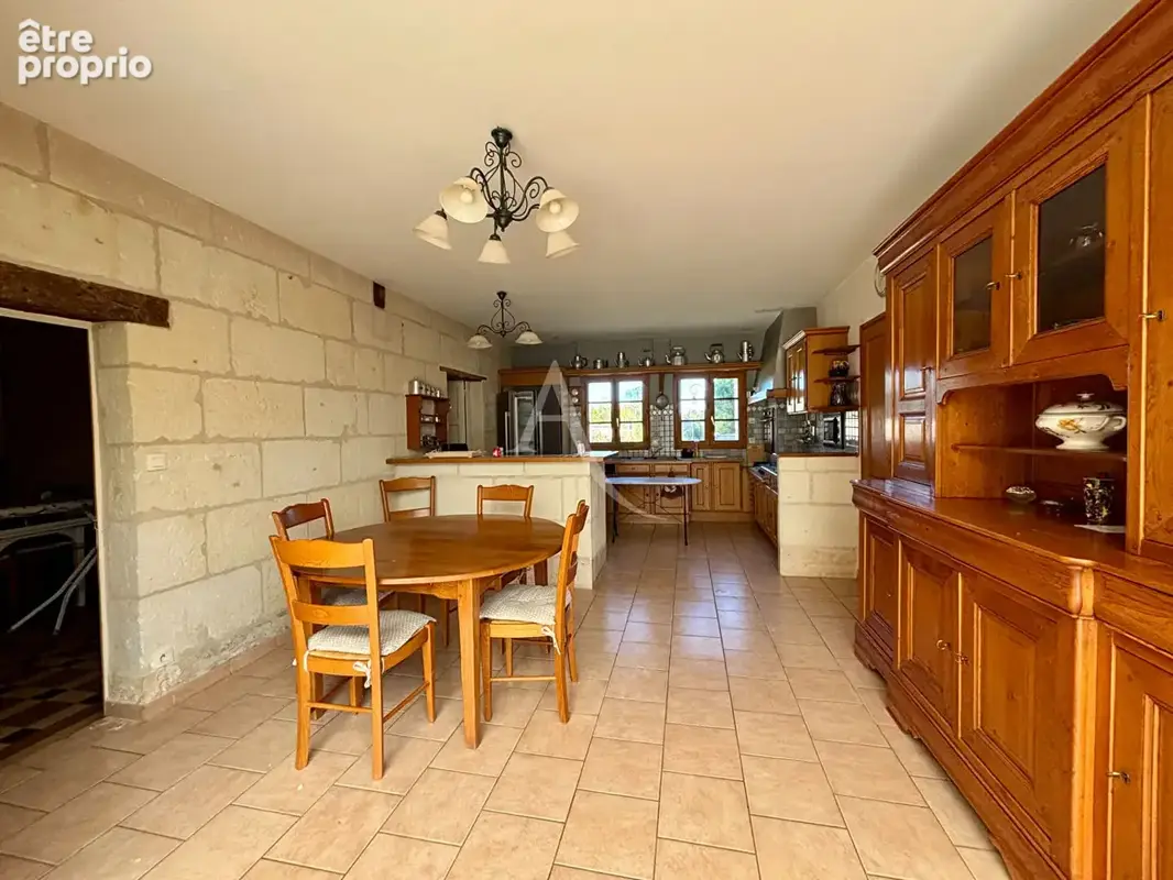 Maison ancienne en parfait état aux mutliples possibilités - photo 5
