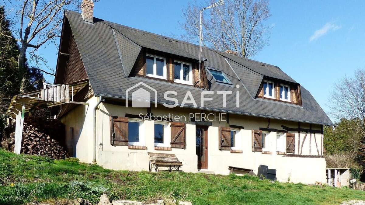 Photo 2 - Maison à SAINT-OUEN-DE-THOUBERVILLE