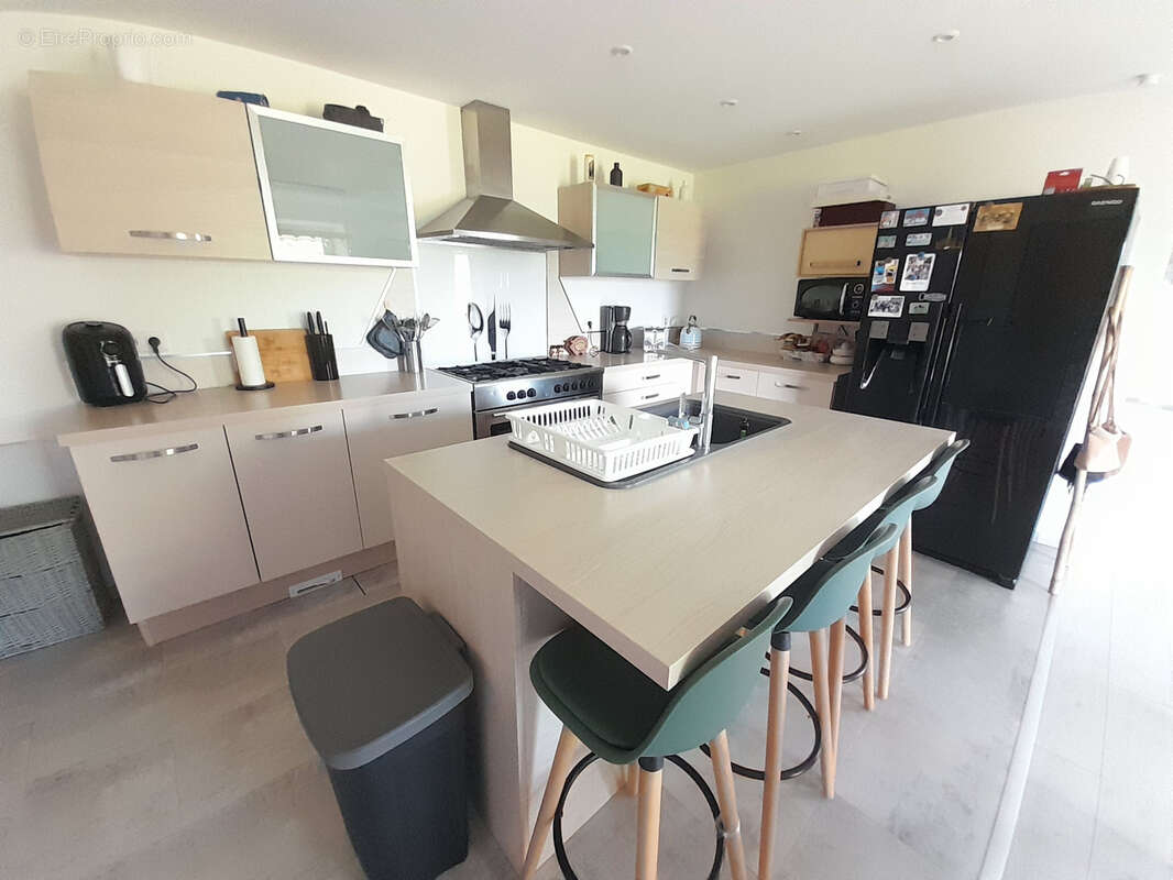 Maison à POUEYFERRE