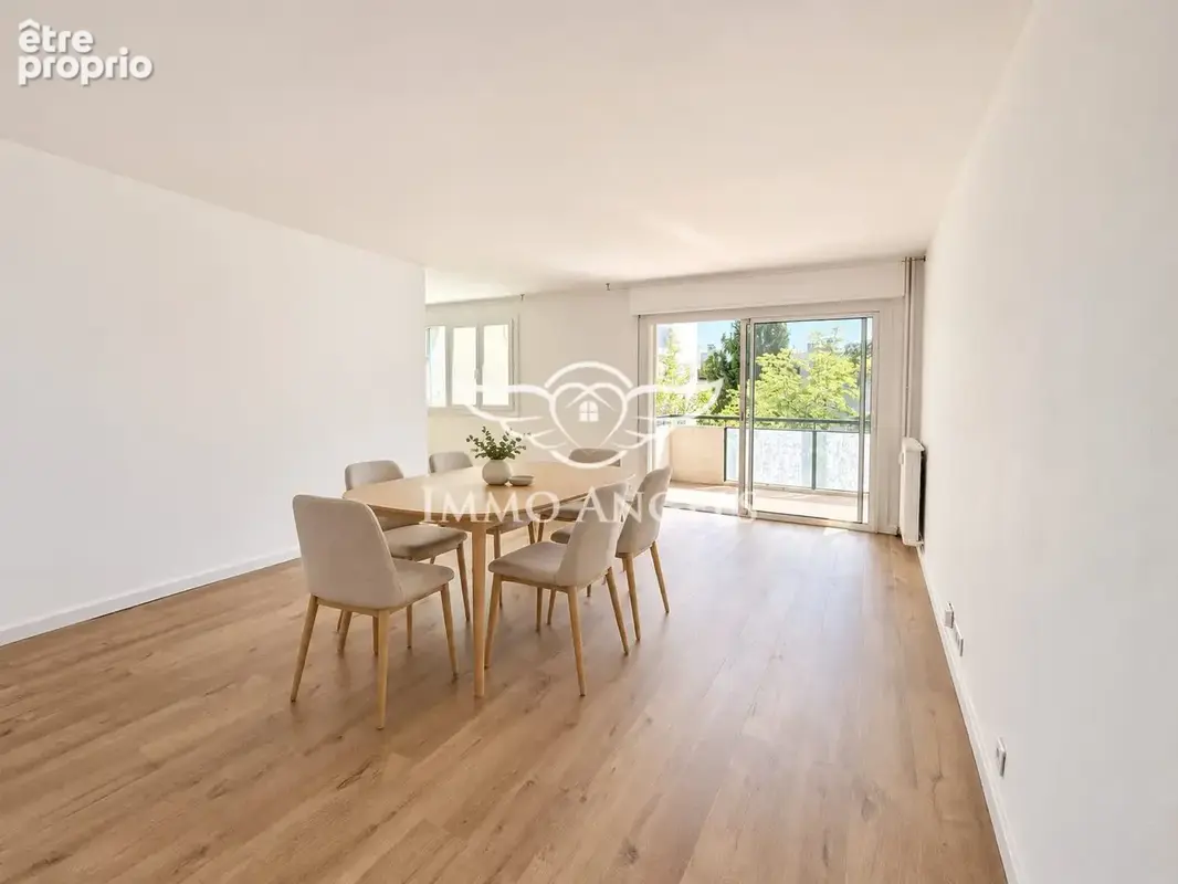 Appartement 4 pièces 82 m² à vendre à Nimes (30900) - photo 2