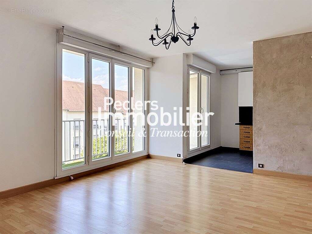 Appartement 3P en centre-ville avec cave et parking - photo 2