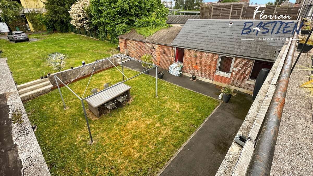 Immeuble en centre-ville – 3 lots – 27 000€/an - photo 9
