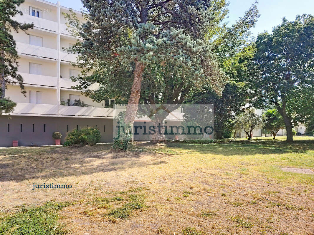 Appartement t2 57 m2 en rdc proche centre ville avec stationnement - photo 2
