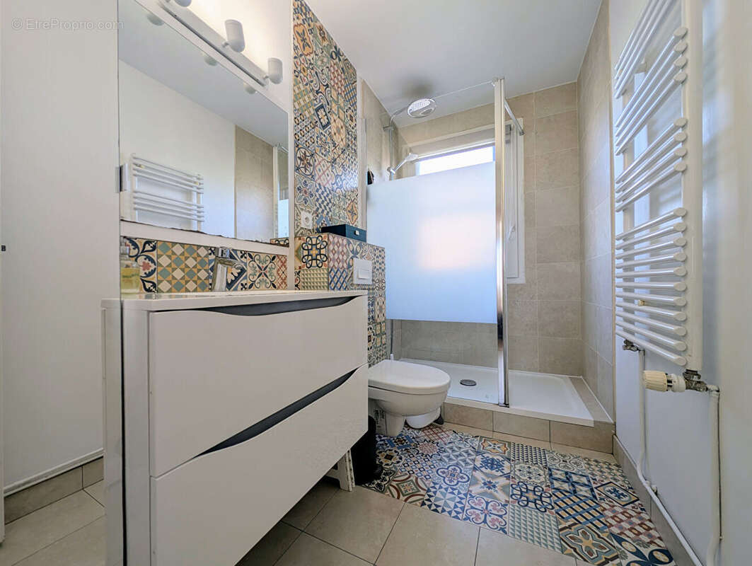Appartement 5 pièces de 80 M² avec Cave et parking extérieur - LE MESNIL LE ROI - photo 10
