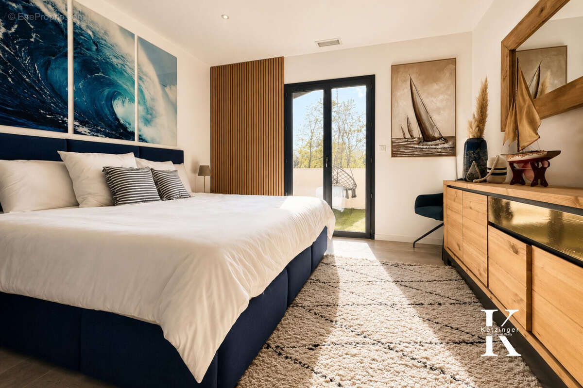 Chambre moderne et lumineuse avec accents marins - Maison à VILLENEUVE-LES-MAGUELONE