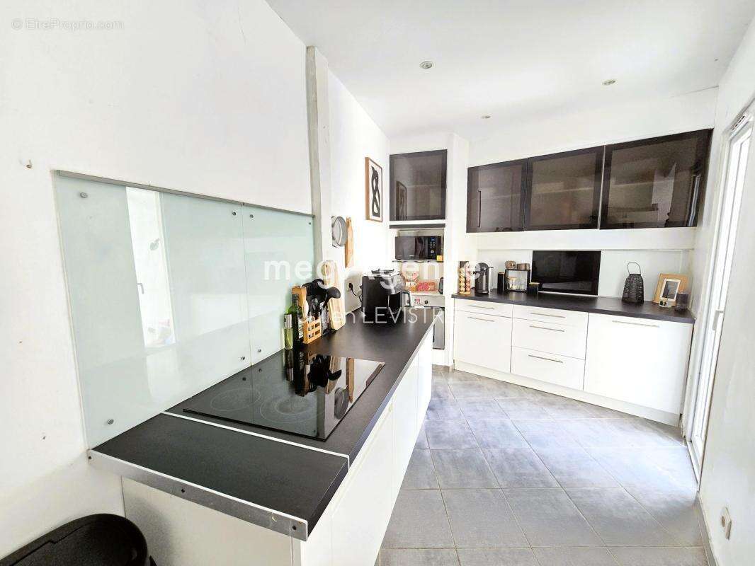 Maison de 6 pièces de 110m² - photo 5