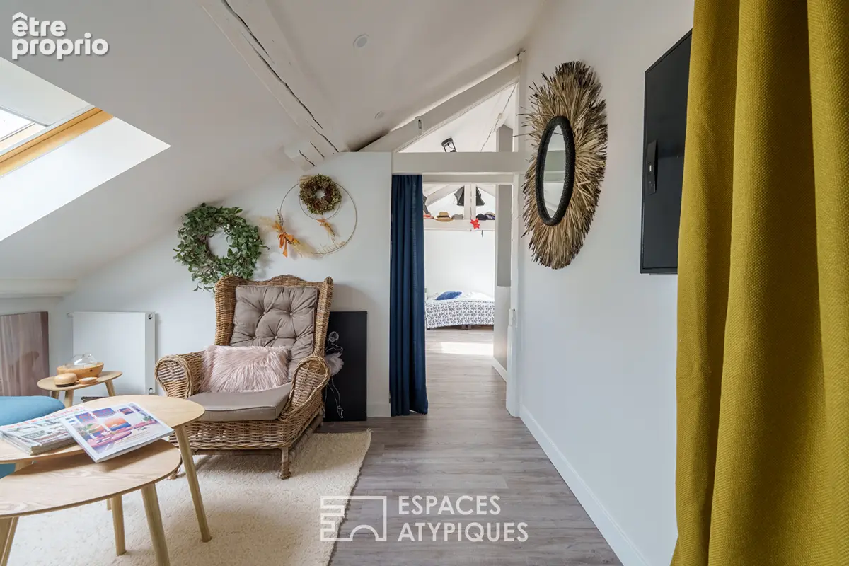 Appartement sous les toits à la charpente apparente - photo 7